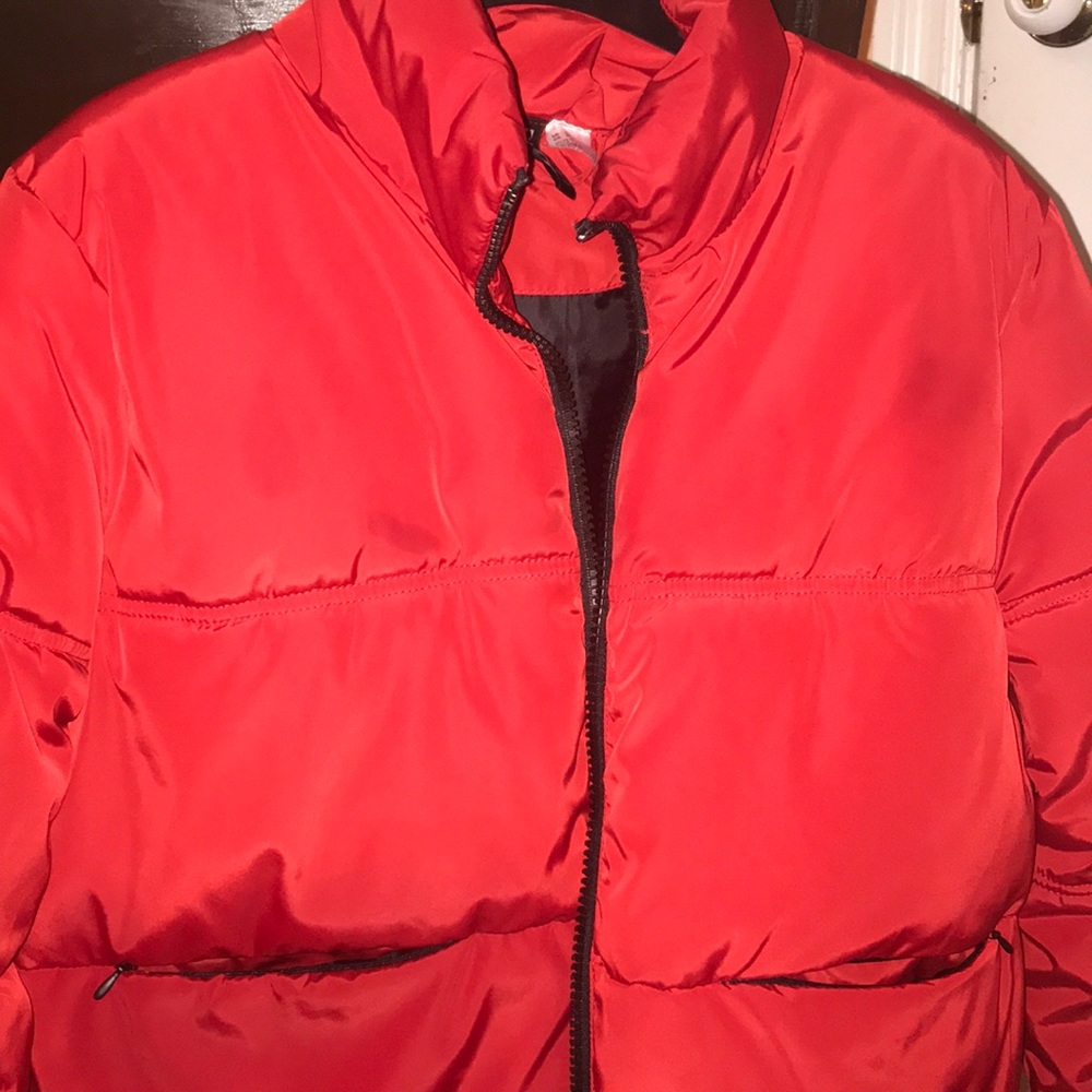 Red puffer jacket from hm brand “divided”